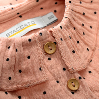 Dress with a button placket